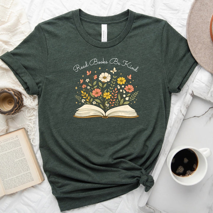 Unisex book lover tee featuring a vintage-style open book with wildflowers, cosmos, and butterflies blooming from the pages