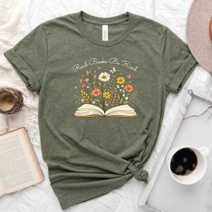 Unisex book lover tee featuring a vintage-style open book with wildflowers, cosmos, and butterflies blooming from the pages