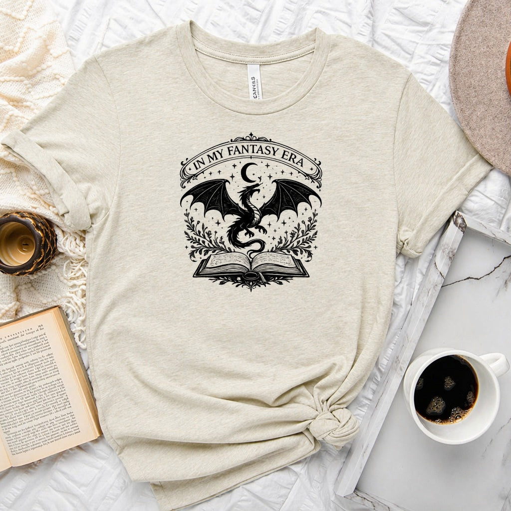 In My Fantasy Era unisex tee with dragon, crescent moon, stars and open book design for book lovers