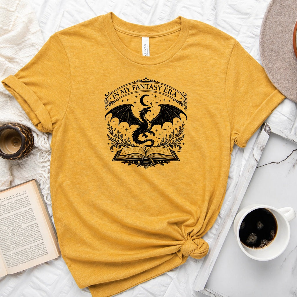 In My Fantasy Era unisex tee with dragon, crescent moon, stars and open book design for book lovers