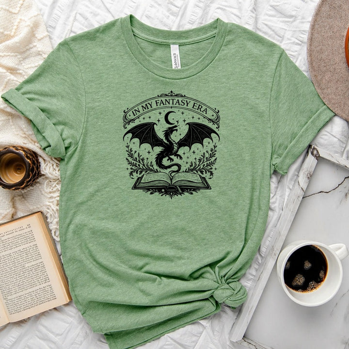 In My Fantasy Era unisex tee with dragon, crescent moon, stars and open book design for book lovers