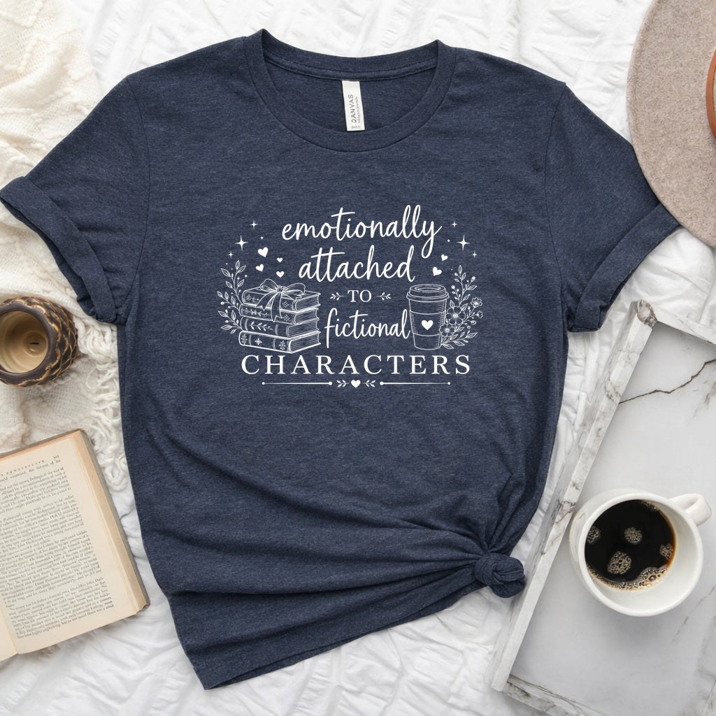 Emotionally attached to fictional characters bookish graphic unisex tee with stacked books and floral wreath design