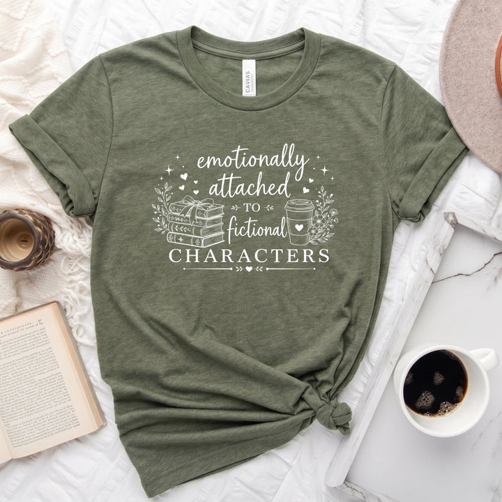 Emotionally attached to fictional characters bookish graphic unisex tee with stacked books and floral wreath design